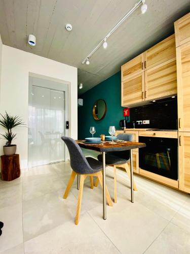 a dining room with a table and chairs at 248 Boutique Studios, Sliema in Sliema