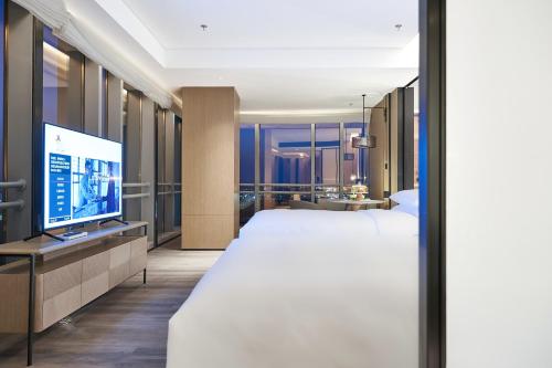 TV a/nebo společenská místnost v ubytování Changzhou Marriott Hotel Jintan