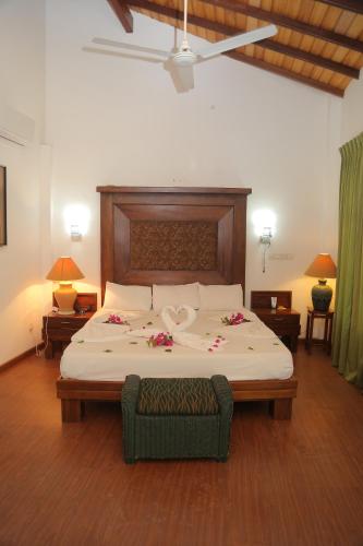 Postel nebo postele na pokoji v ubytování Laluna Ayurveda Resort