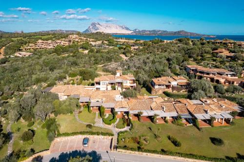 an aerial view of a house with mountains in the background at Villa Valentina 250m From The Beach - Happy Rentals in Puntaldia