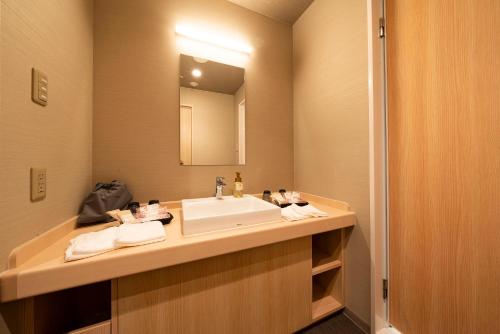 Koupelna v ubytování Grandvrio Hotel Unazukionsen