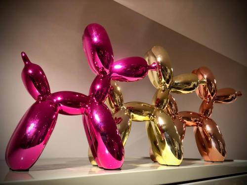 a group of purple and gold balloons on a shelf at Appartement Sunny home Deluxe in Knokke-Heist