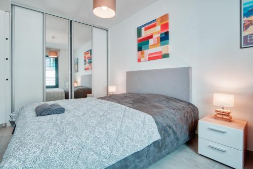 Posteľ alebo postele v izbe v ubytovaní Ô Fil de l'Eau - Appartement standing vue mer A08 T2