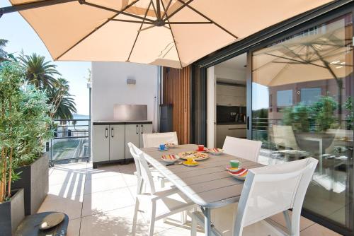 Balkón alebo terasa v ubytovaní Ô Fil de l'Eau - Appartement standing vue mer A08 T2
