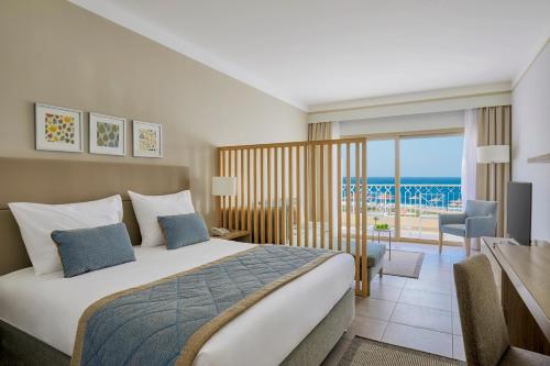 Cama o camas de una habitación en JAZ Elite Maraya
