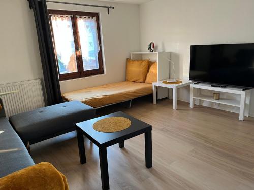Μια τηλεόραση ή/και κέντρο ψυχαγωγίας στο Chouett'Appart proche frontières