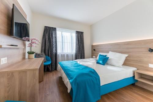 Postel nebo postele na pokoji v ubytování Hotel Franz Anton
