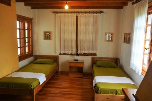 Ένα ή περισσότερα κρεβάτια σε δωμάτιο στο LILA Apartments