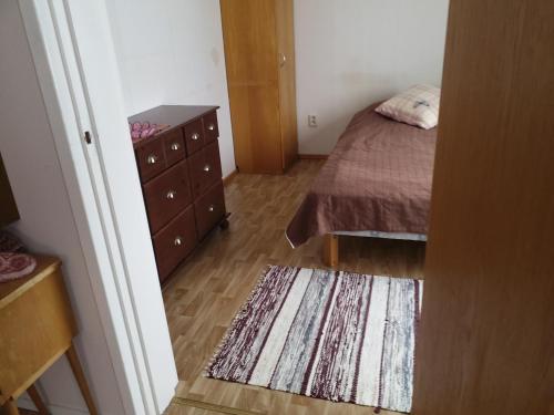 Ein Bett oder Betten in einem Zimmer der Unterkunft Metsälä