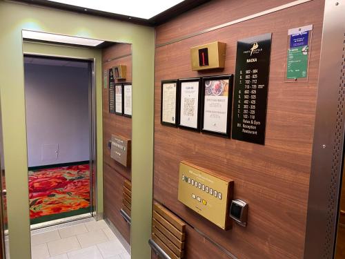 a elevator in a hospital with a door open at ProfilHotels Nacka in Stockholm