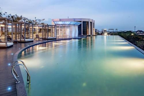 a large swimming pool on top of a building at Troika Residensi Kota Bharu Family Suite by AGhome in Kota Bharu