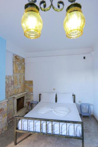 Postel nebo postele na pokoji v ubytování John's Guesthouse