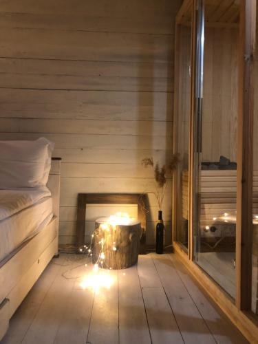 Giường trong phòng chung tại Kostovac Boutique Homes - Sauna