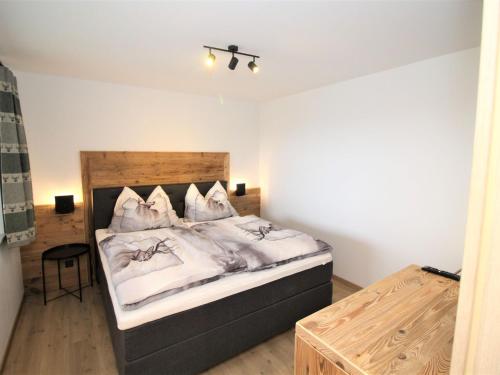 Ένα ή περισσότερα κρεβάτια σε δωμάτιο στο Chalet Mountain Lodge - Klippitztörl by Interhome