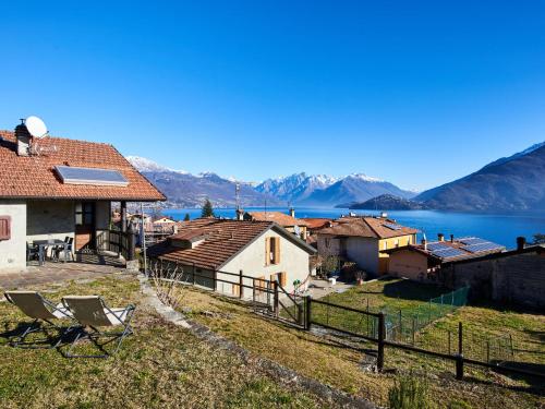 a village with a view of the water and mountains at Holiday Home Il Crotto by Interhome in Pianello Del Lario