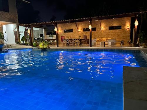 Der Swimmingpool an oder in der Nähe von Casa dos 3 coqueiros