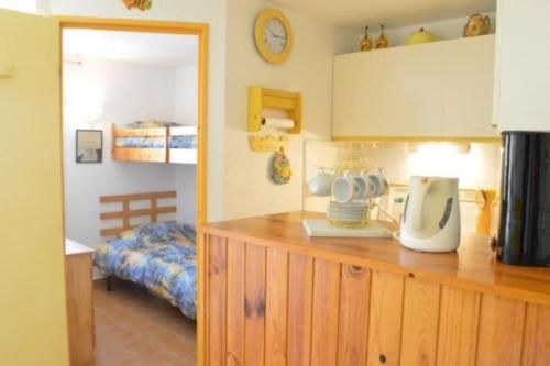 Η κουζίνα ή μικρή κουζίνα στο Charmant appartement à deux pas de la plage