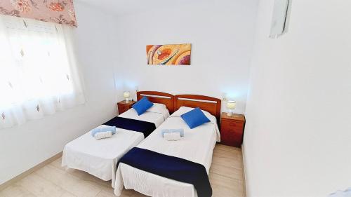 Postel nebo postele na pokoji v ubytování Apartamentos Navarra 08 Familidays