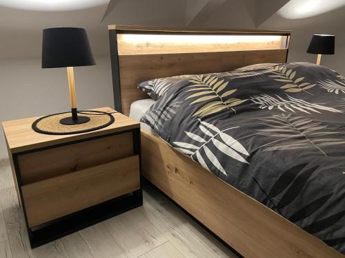Postel nebo postele na pokoji v ubytování Pogodna Zagroda-Dom na Kaszubach & Strefa Spa