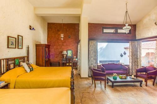 Zona de estar de Villa Urvinkhan Resorts Chikmagalur