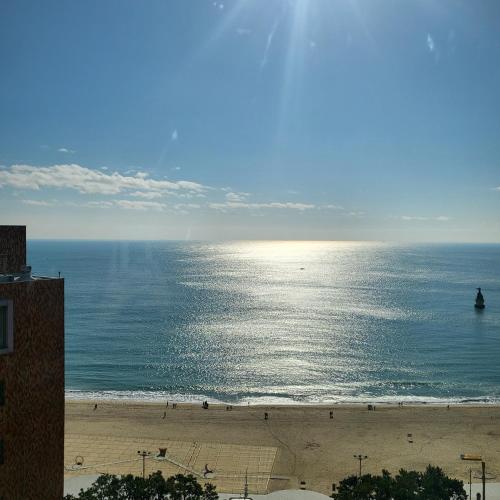 a view of the ocean with people on the beach at Toyoko Inn Busan Haeundae 2 in Busan