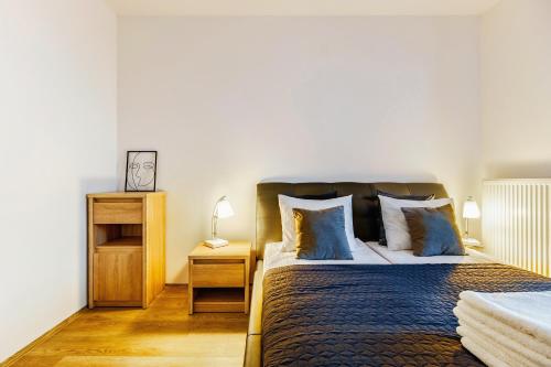 Ένα ή περισσότερα κρεβάτια σε δωμάτιο στο Aparthotel Plac Litewski Premium