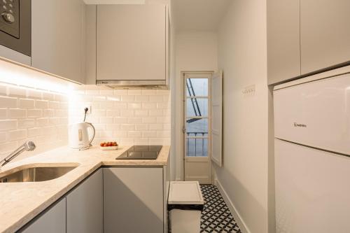 Η κουζίνα ή μικρή κουζίνα στο Alfama Chic Penabuquel3