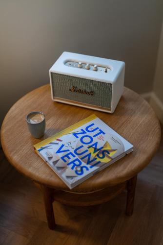 a table with a radio and a box on it at Hotel Mayfair in Copenhagen