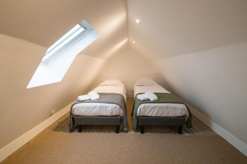 Postel nebo postele na pokoji v ubytování GWEL AR MOR - Jolie maison de charme rénovée proche du port