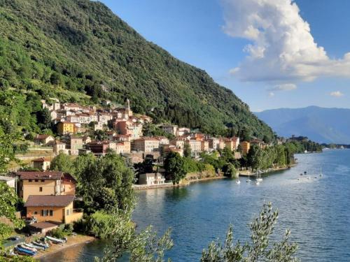 a small town on the shore of a river at Villa Angela in Dorio