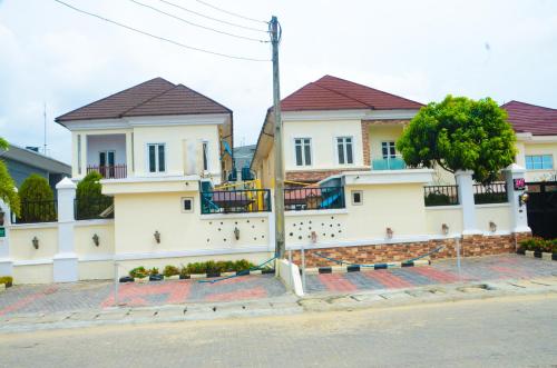a row of houses on a street at J Gibson suite in Lekki