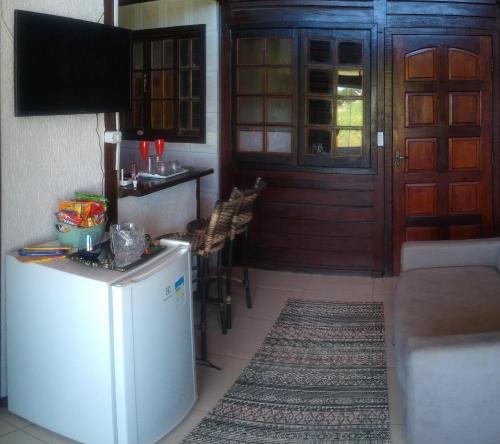 TV a/nebo společenská místnost v ubytování Farol House