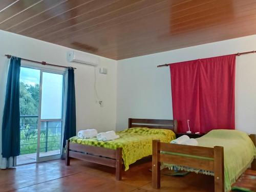 Postel nebo postele na pokoji v ubytování La Casita