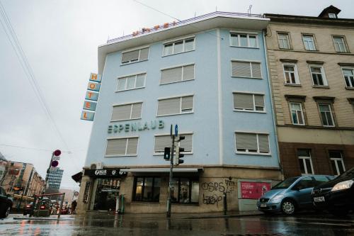 a blue building on the corner of a street at Espenlaub in Stuttgart