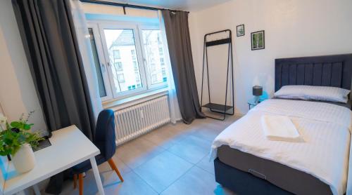 Una cama o camas en una habitación de Espenlaub