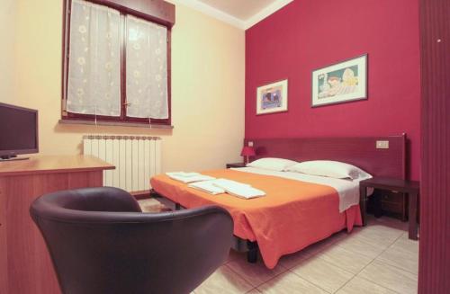 Postel nebo postele na pokoji v ubytování Hotel Rose&Crown