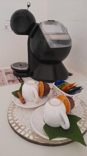 Kemudahan buat kopi dan teh di Aconchego da Roça