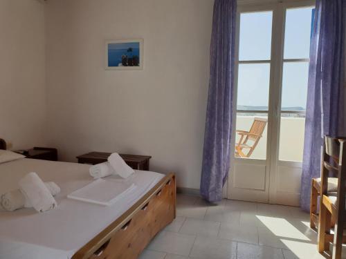 Posteľ alebo postele v izbe v ubytovaní Silver Rocks Hotel
