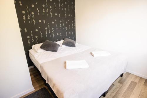 Cama o camas de una habitación en Manor Apartments, Csopak