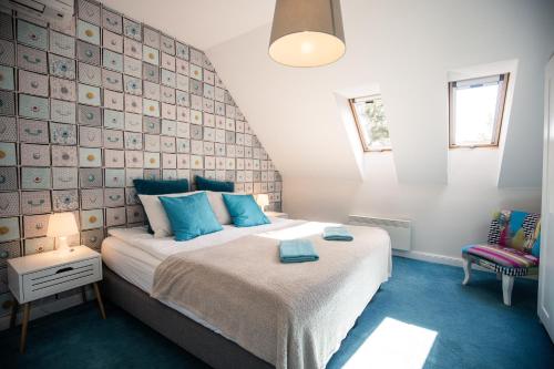 Cama o camas de una habitación en Manor Apartments, Csopak