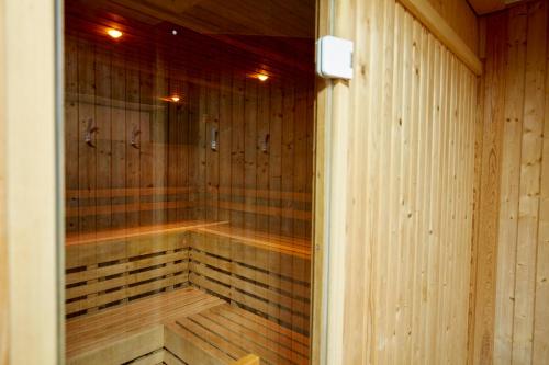 a room with a sauna with wooden walls at Coldra Court Hotel by Celtic Manor in Newport