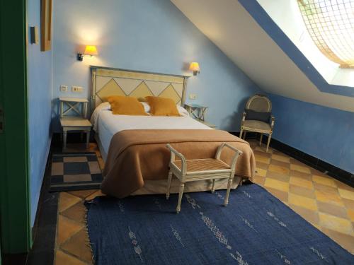 Ένα ή περισσότερα κρεβάτια σε δωμάτιο στο Hotel Casa Henrietta