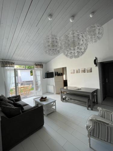 Χώρος καθιστικού στο MAISONS DE VACANCES LES RÉTHAISES