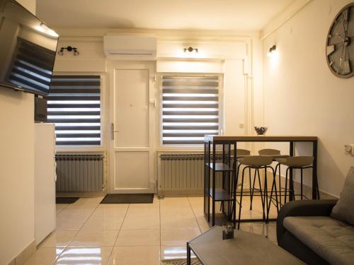 Posezení v ubytování Studio Apartman SubUrban