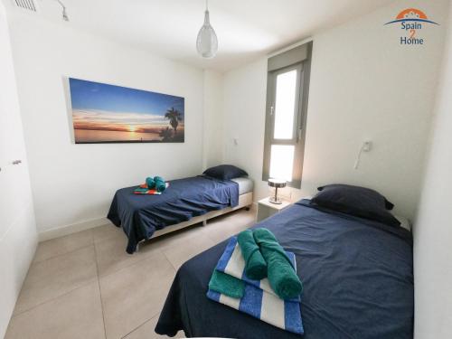 Postel nebo postele na pokoji v ubytování Panorama Beach II by Spain2home