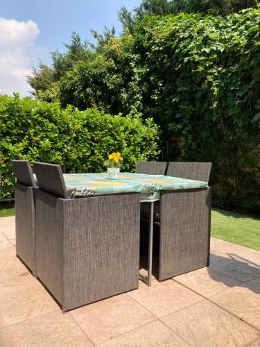 a table and chairs on a patio at Residenza stadio in Turin