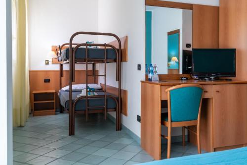 Postel nebo postele na pokoji v ubytování Hotel Alisei