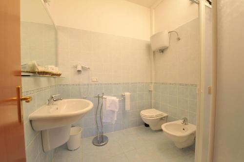 Koupelna v ubytování Hotel Astor