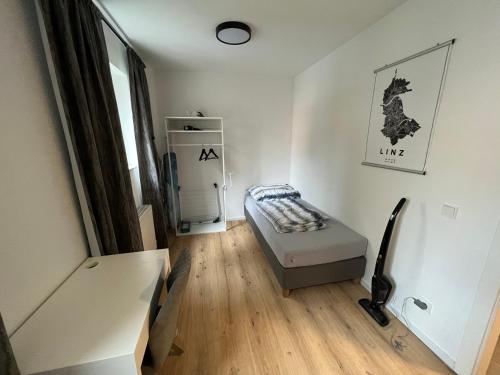 Tempat tidur dalam kamar di Modern Apartments Bahnhofsnähe