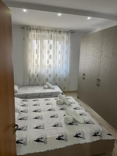 Ένα ή περισσότερα κρεβάτια σε δωμάτιο στο Meco Apartment